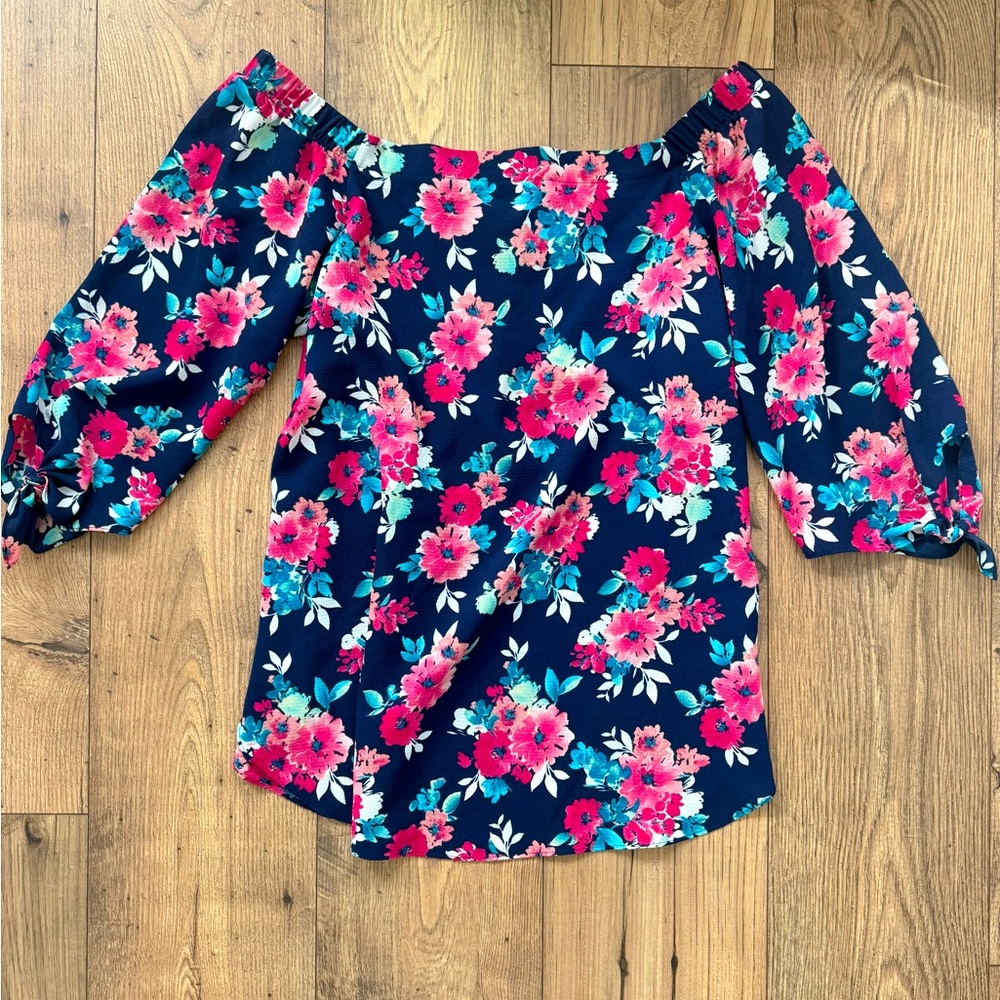 Women’s off the shoulder blouse from Status by Chanel’s, size L